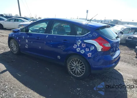2013 Ford Focus Titanium z USA, uszkodzony, nr VIN 1FADP3N22DL128971